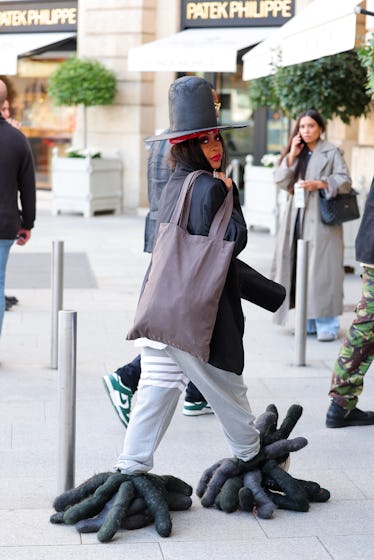 Erykah Badu wearing enormous shoes at Paris Fashion Week