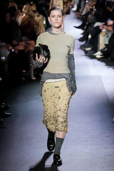 Ethel Cain walking the spring 2023 Miu Miu show in a calf-length skirt