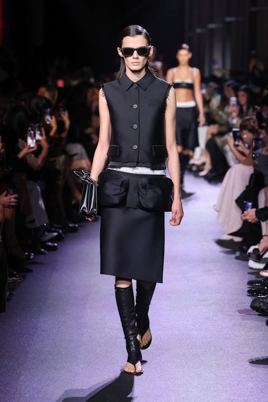 A model walks the runway during the Miu Miu Womenswear Spring/Summer 2023 show as part of Paris Fash...