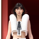 HoYeon opening the spring 2023 Louis Vuitton show in a monochrome ensemble