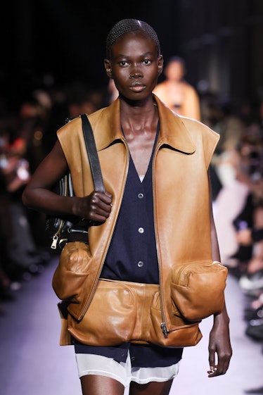 A model walks the runway during the Miu Miu Womenswear Spring/Summer 2023 show as part of Paris Fash...