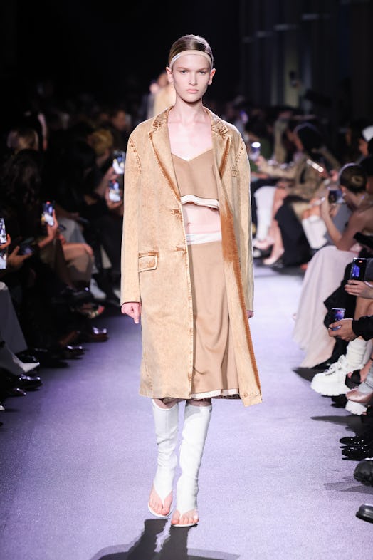  A model walks the runway during the Miu Miu Womenswear Spring/Summer 2023 show as part of Paris Fas...