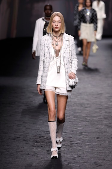 A model walks the runway during the Chanel Womenswear Spring/Summer 2023 show as part of Paris Fashi...