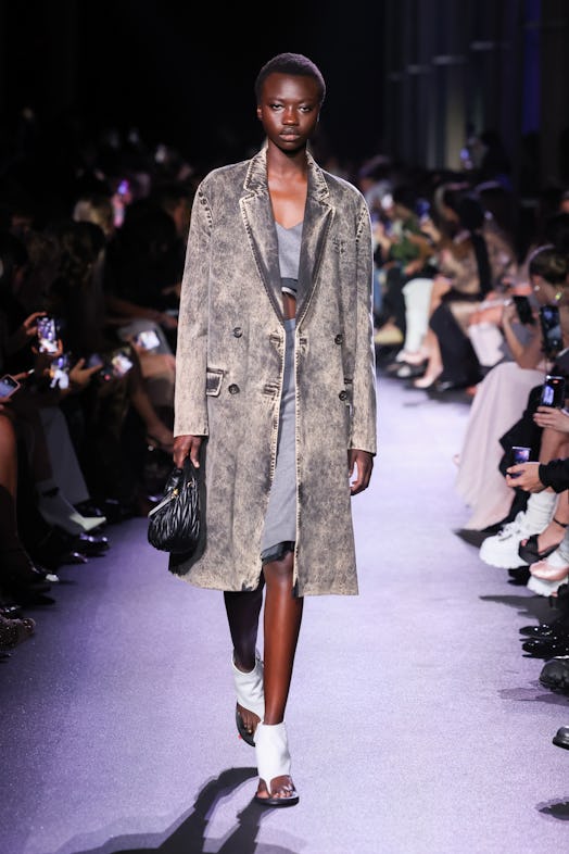  A model walks the runway during the Miu Miu Womenswear Spring/Summer 2023 show as part of Paris Fas...