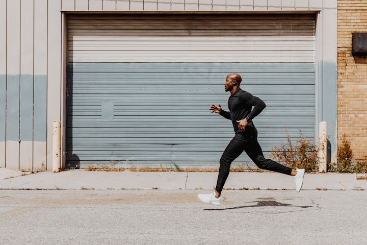 A man running in a city.