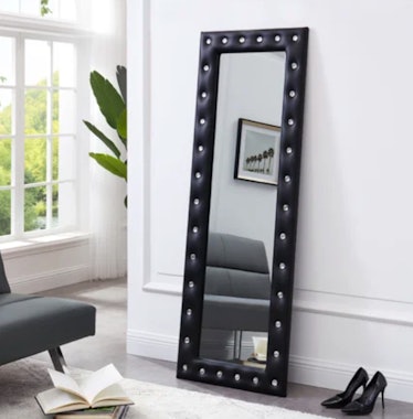 The. crystal tufted black floor mirror from Wayfair is a home decor dupe inspired by Emma Chamberlai...