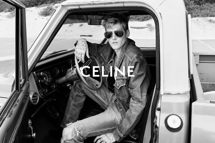 Presley Gerber sitting in a car in a black-and-white Celine campaign