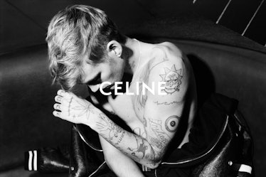 A shirtless Presley Gerber looking down in a black-and-white Celine campaign