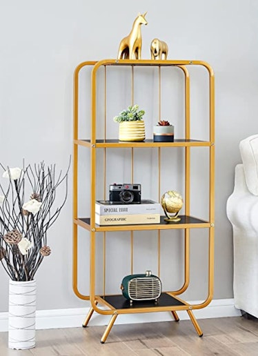 The Saygoer Gold Bookshelf from Amazon is a decor dupe inspired by Emma Chamberlain home design.