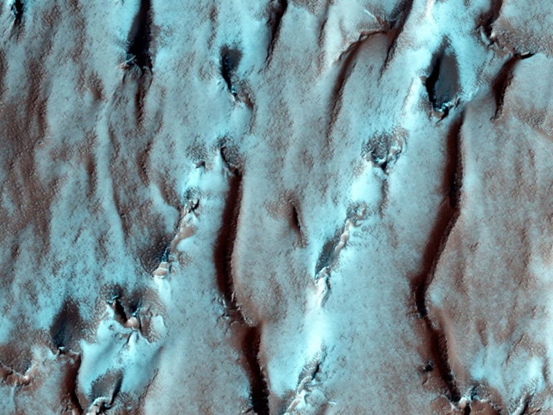 This image from NASA’s Mars Reconnaissance Orbiter shows the edge of the Martian South Pole Layered ...