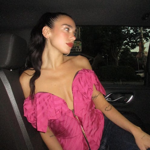 Dua Lipa hair half back
