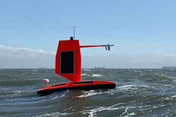 A saildrone vehicle collects data in the ocean.