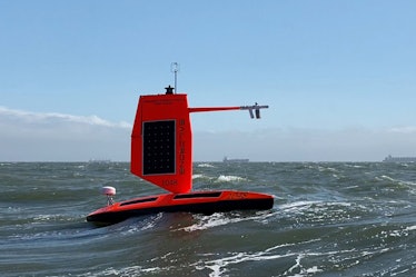 A saildrone vehicle collects data in the ocean.