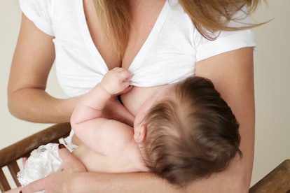 how to hold breast when breastfeeding with flat nipples