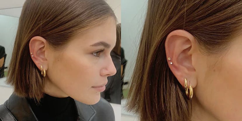 Kaia Gerber got a snakebite ear piercing at Studs in 2019. The studio's signature style is two daint...