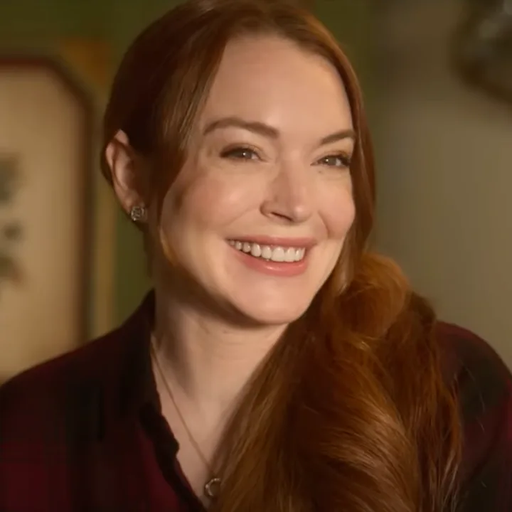 Lindsay Lohan stars in Netflix's holiday movie, "Falling for Christmas," with Chord Overstreet.