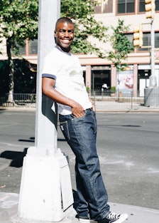 Tyrell Hampton wears a Wales Bonner T-shirt; Carhartt WIP jeans; Converse sneakers.