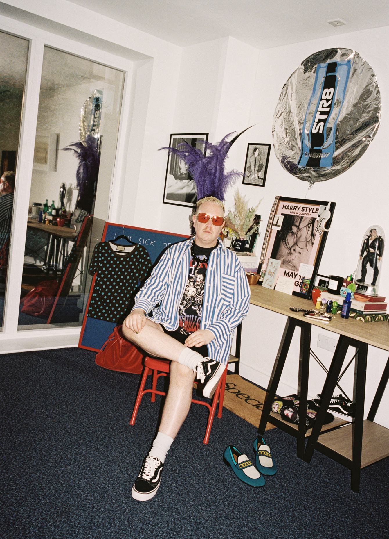 Harry Lambert wearing his own clothing and accessories.