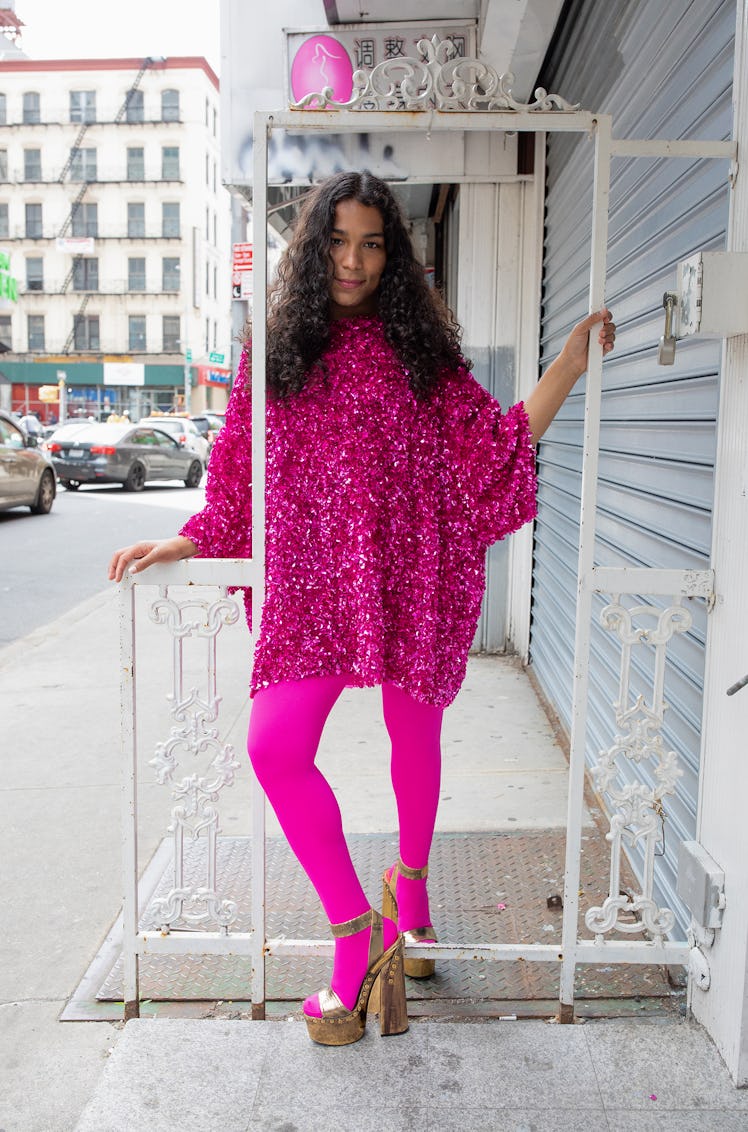 Devin Halbal wears a Valentino dress and tights; stylist’s own shoes.