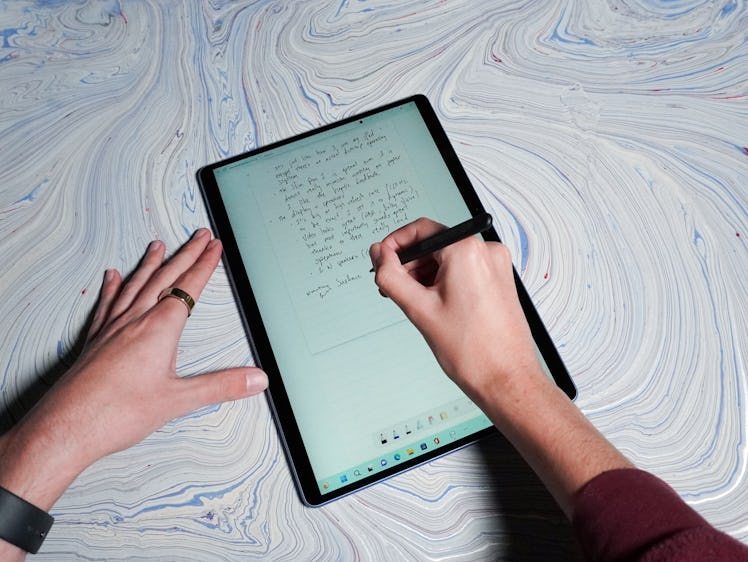 Writing on the Surface Pro 9 with the Slim Pen 2.