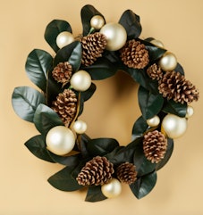 24in Artificial Magnolia Leaf And Pinecone Wreath is a must have from HomeGoods 2022 Holiday collect...