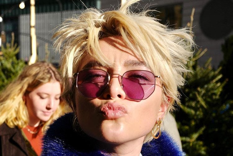 Florence Pugh wears a mixie shag haircut in December 2021.