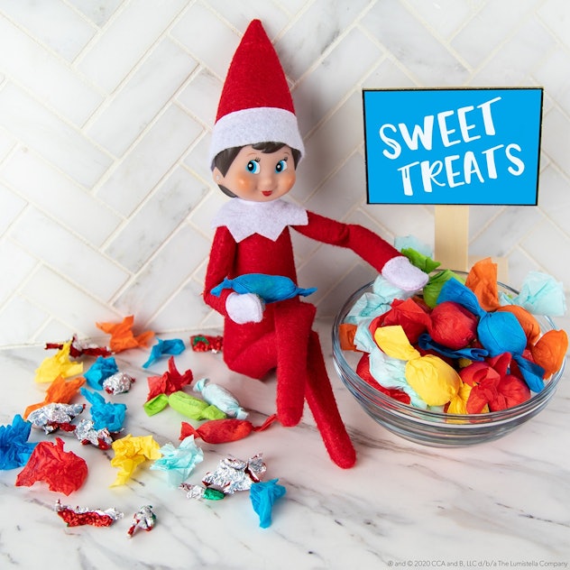 Place your elf next to a bowl of half-eaten candies for an easy Elf on the Shelf idea.