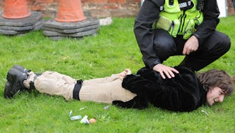 YORK, ENGLAND - NOVEMBER 09: A member of the public is arrested by Police after throwing eggs at Kin...
