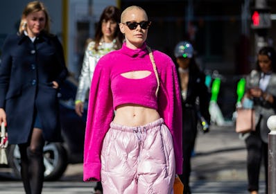 Thora Valdimars seen wearing pink puffer pants, cropped jumper outside Miu Miu during Paris Fashion ...