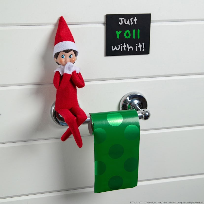 For an easy Elf on the Shelf idea, replace a roll of toilet paper with some gift wrap.