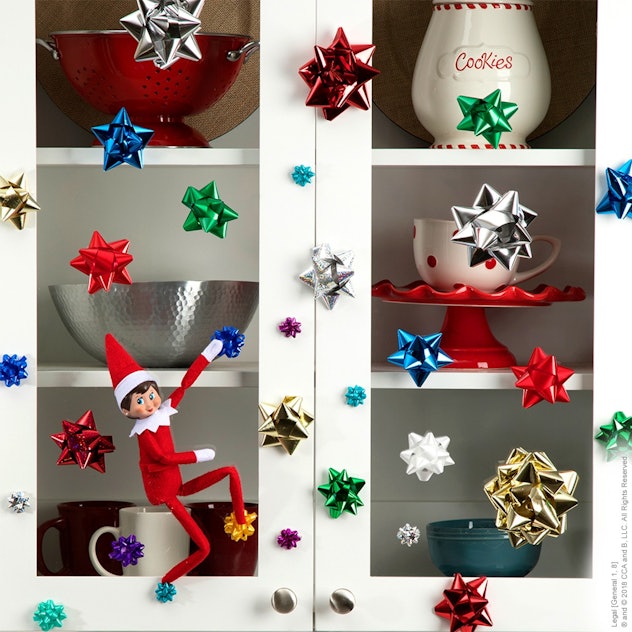 One easy Elf on the Shelf idea for home is to make a ribbon rock climbing wall. 