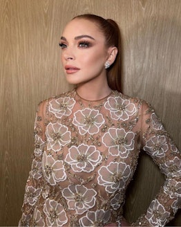 Lindsay Lohan 2022 bronze makeup and ponytail