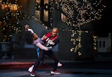 Maria-Clara, played by Caché Melvin, and the Nutcracker, played by Fik-Shun Stegall, in Disney's Th...