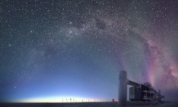 image of a concrete building on a plain of ice beneath a starry night sky