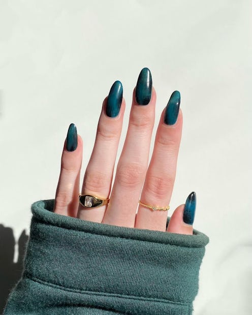dark green nails with marbling