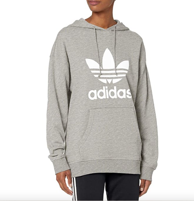 This sporty adidas sweatshirt is soft and comfortable. 