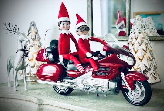 here's an elf on the shelf christmas eve idea: posing elf on a motorcycle