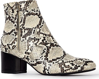 a pair of snakeskin ankle booties with a contrasting block heel