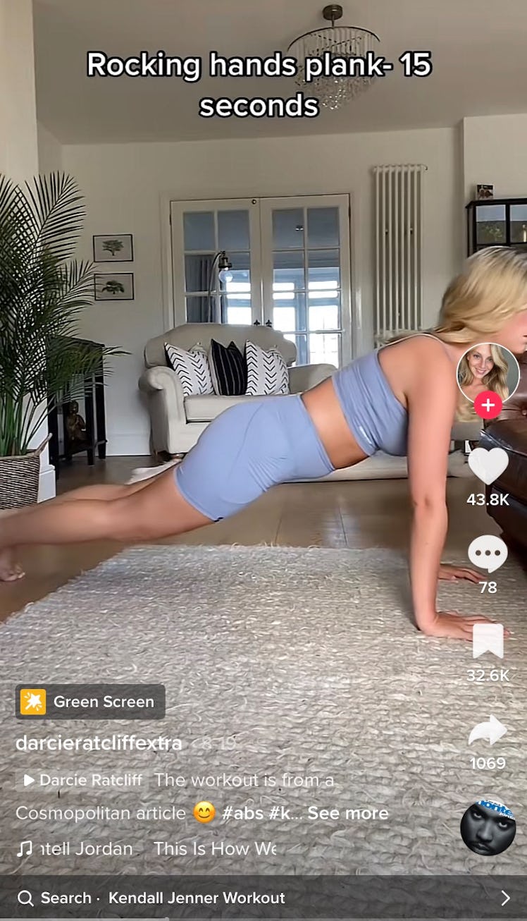 A TikToker does a plank as part of Kendall Jenner's 11-minute ab workout on TikTok. 