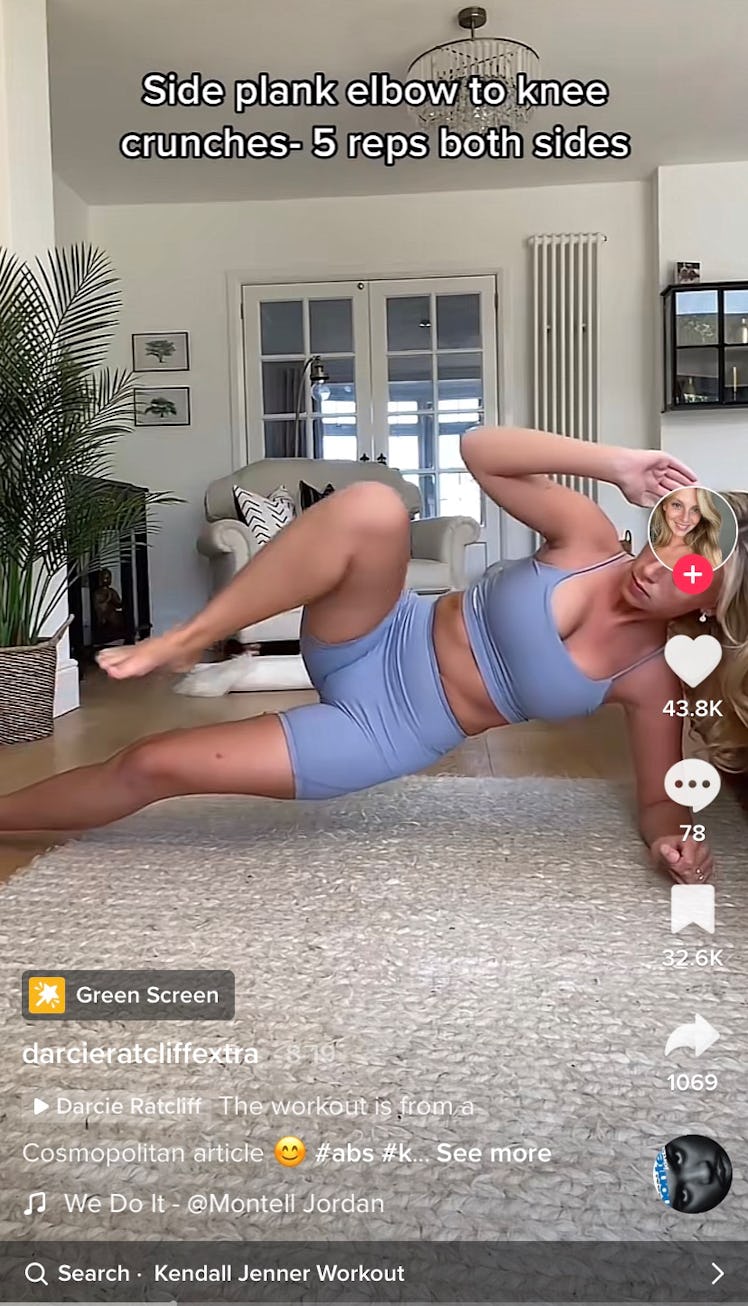 A TikToker does knee crunches as part of Kendall Jenner's 11-minute ab workout on TikTok. 