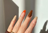 Need ideas for Thanksgiving nails in 2022? Here are festive, fall manicures to use for nail art insp...