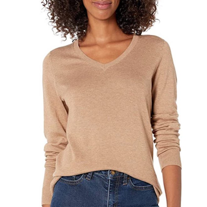 This lightweight v-neck sweater has a loose, but comfortable fit with ribbed cuffs and hem.
