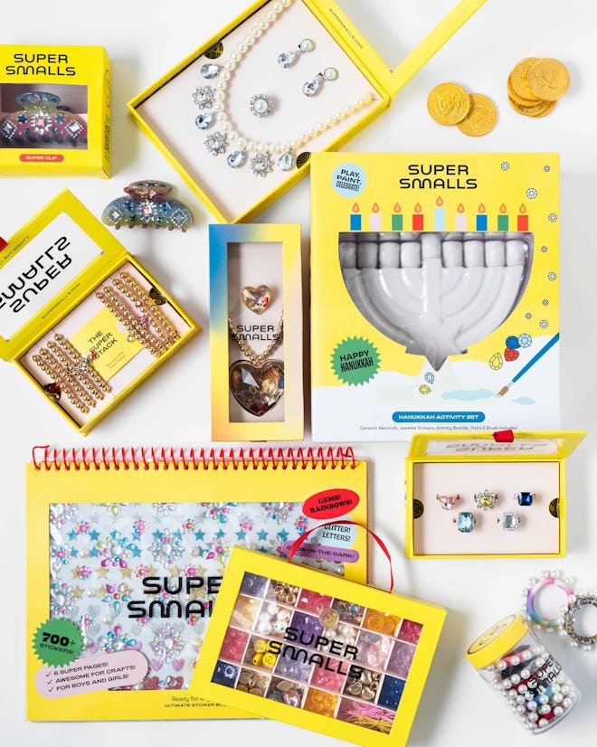 This Hanukkah gift set includes a menorah to paint and lots of play jewelry.