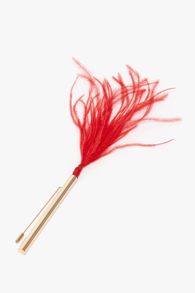 Victoria Beckham red and gold feather brooch