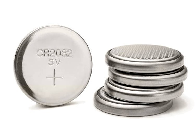 Button batteries, stacked.