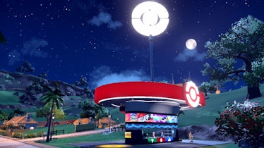 Moon shining above outdoor Pokemon Center in Paldea