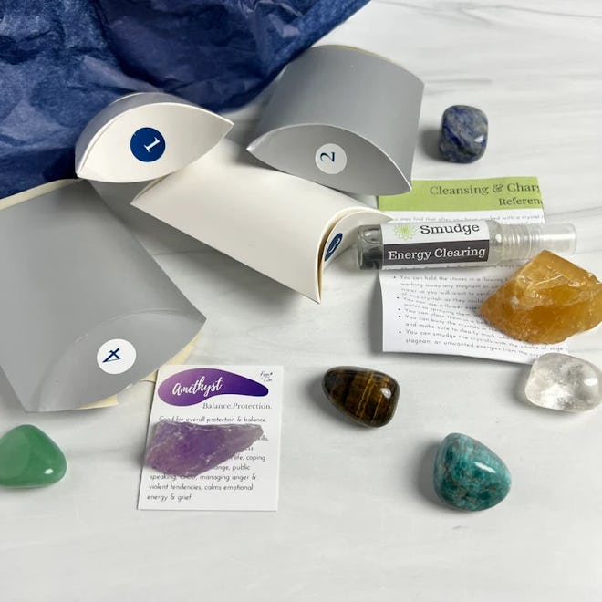 This Hanukkah gift set includes a series of eight crystals and info about them.
