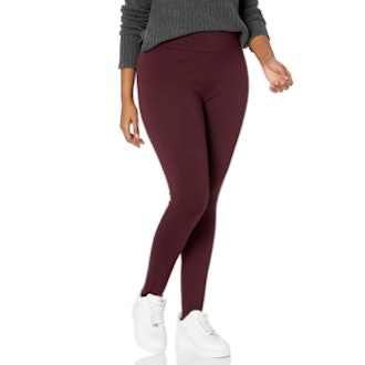 These ponte pants feature clean lines, flat seams, and stirrups for a smooth, streamlined look.