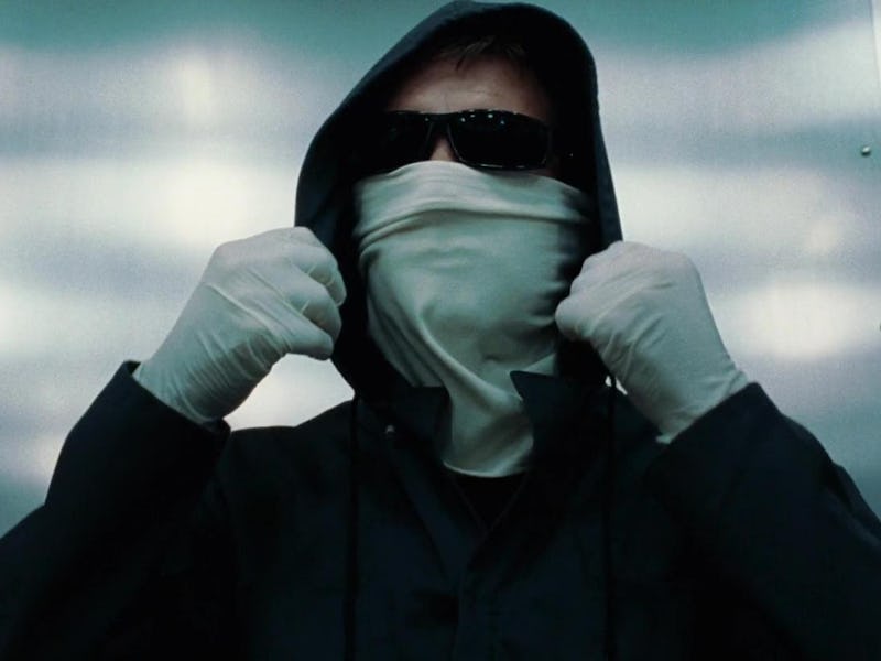 A bank robber wears a hood, mask, gloves, and sunglasses in Spike Lee's Inside Man