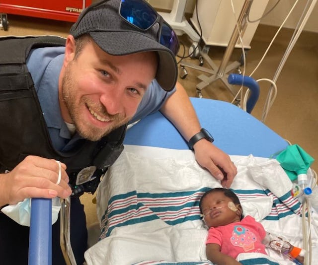Two police officers saved the life of a one-month-old baby suffering from RSV.